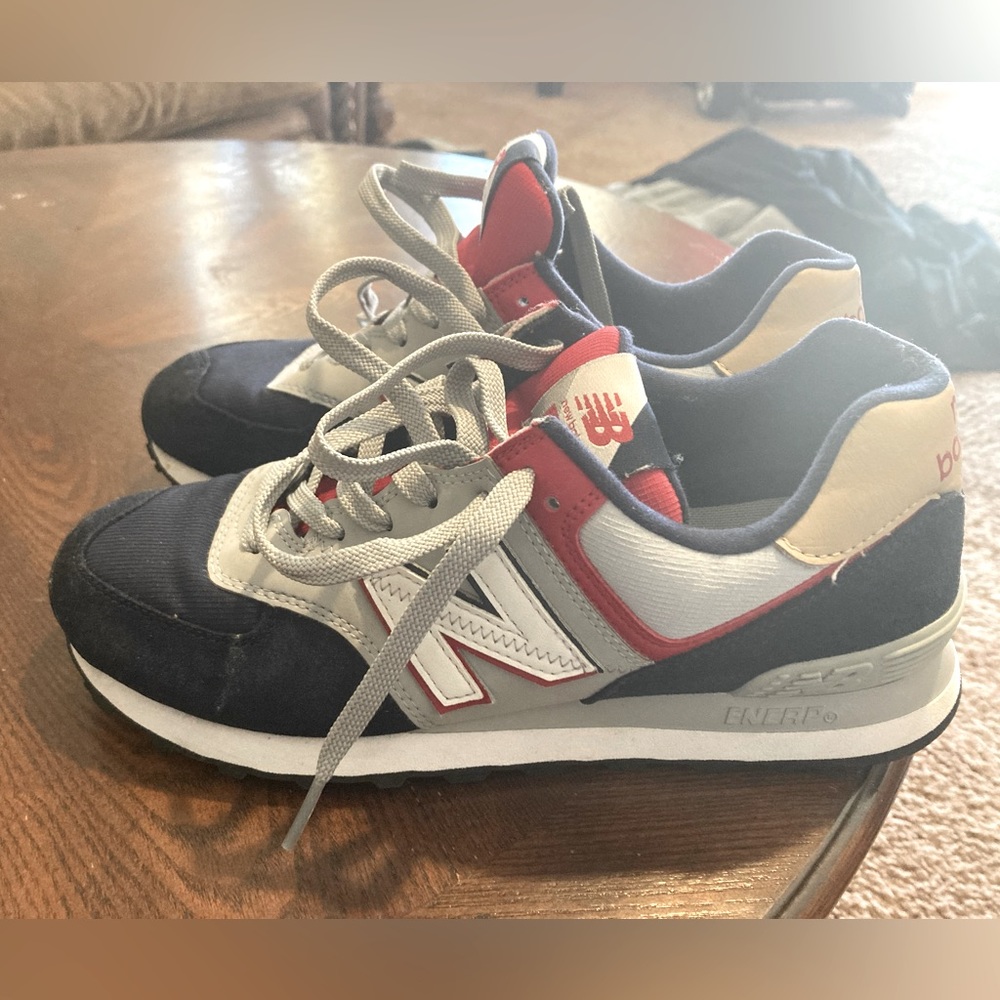 Selling my gently used new balance 574  size 7.5 color blue/gray/red/tan